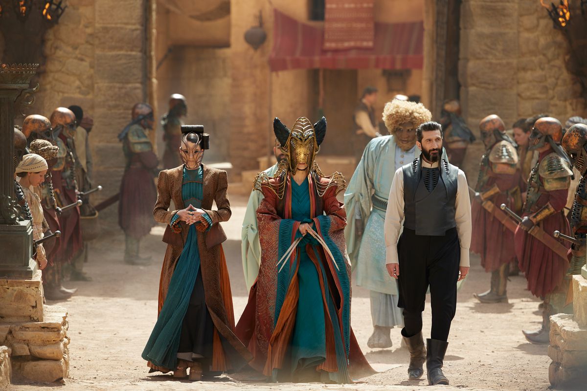 Seanchan representatives and the Dark One walk in a still from Wheel of Time season 2