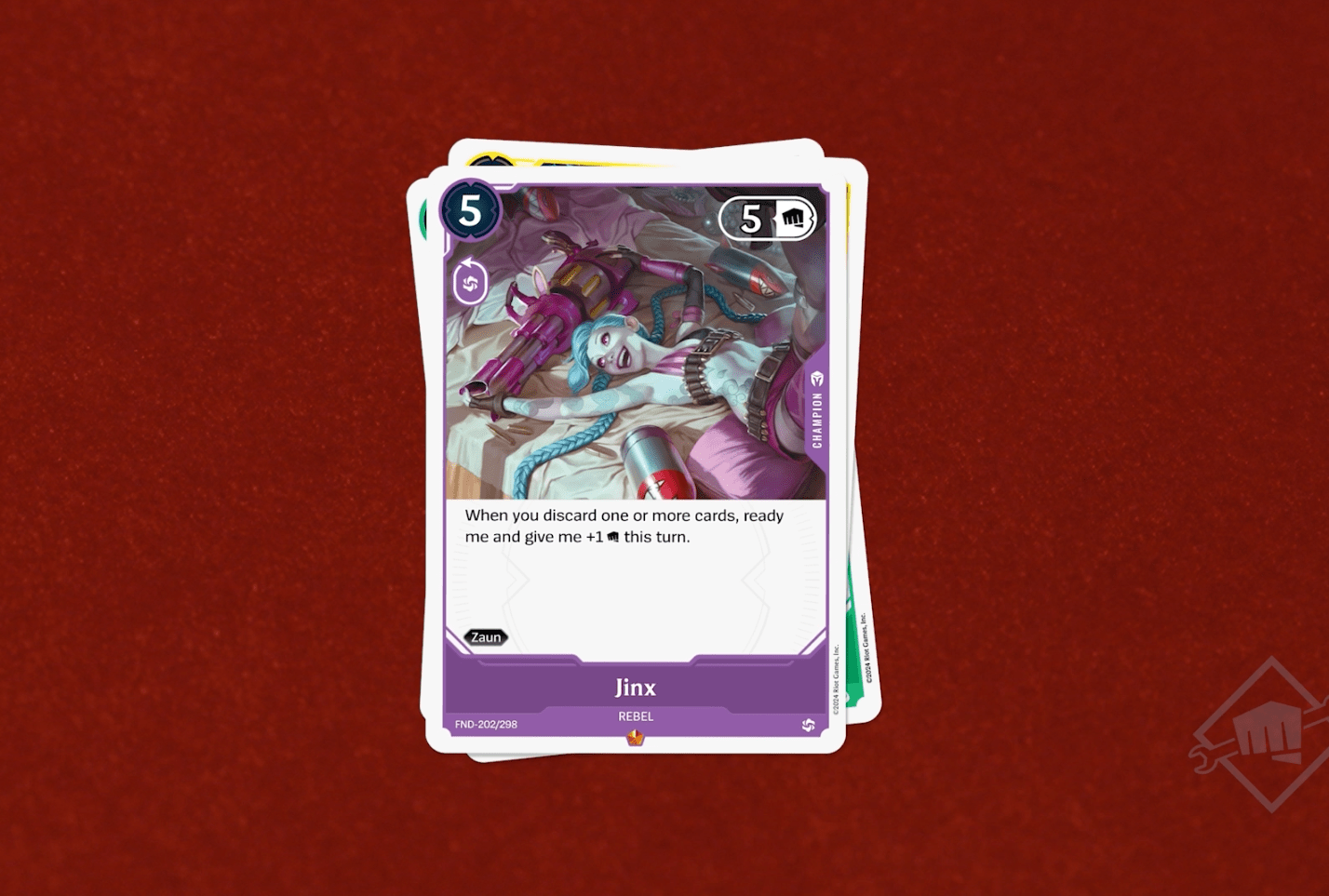 Jinx’s 5/5 champion card in Project K, Riot Games’ League of Legends trading card game. The text reads: When you discard one or more cards, ready me and give me +1 [punching logo] this turn